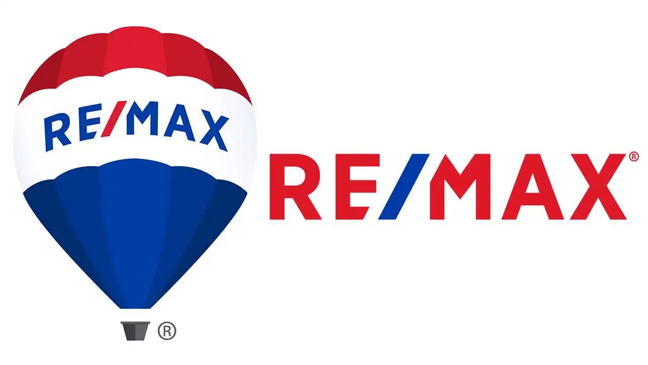 RE/MAX hot air balloon logo beside red wordmark on white background