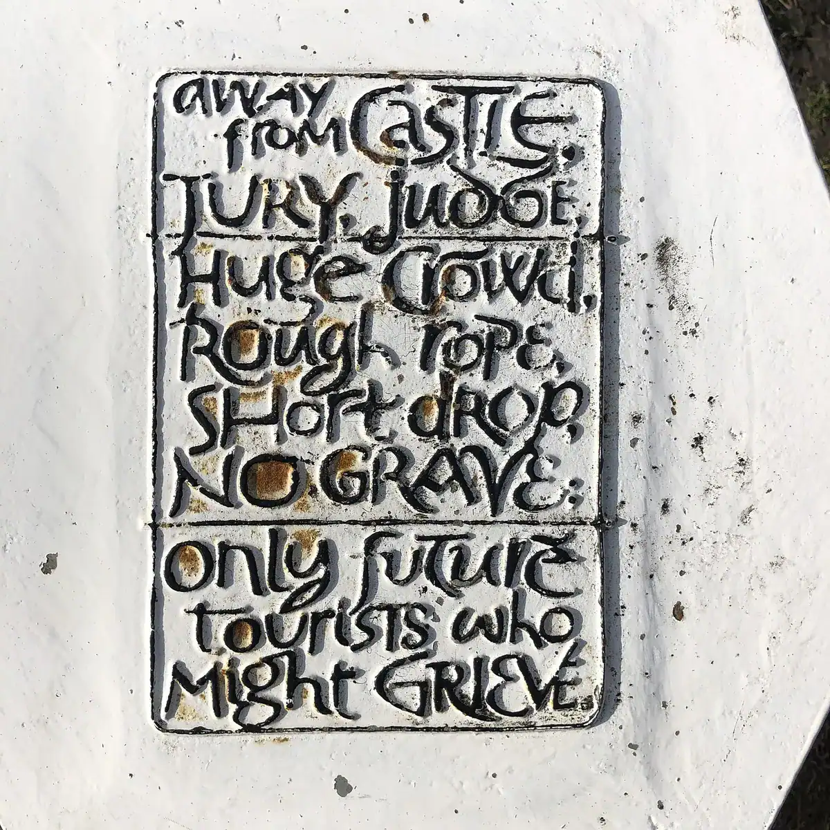 Illustration of Extreme close-up photography of a hand holding a vintage dip pen, creating elegant Spencerian.