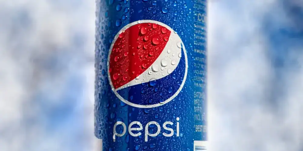 Close-up of a condensed Pepsi can with the logo visible