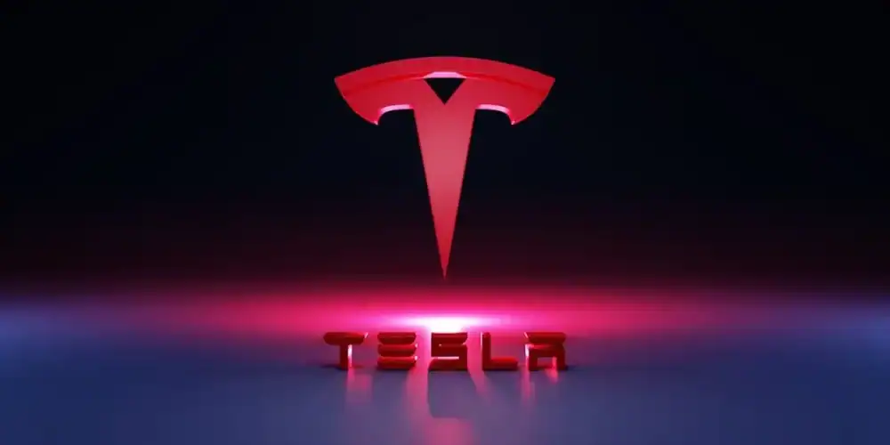 Red 3D Tesla emblem with glowing TESLA wordmark on a reflective surface