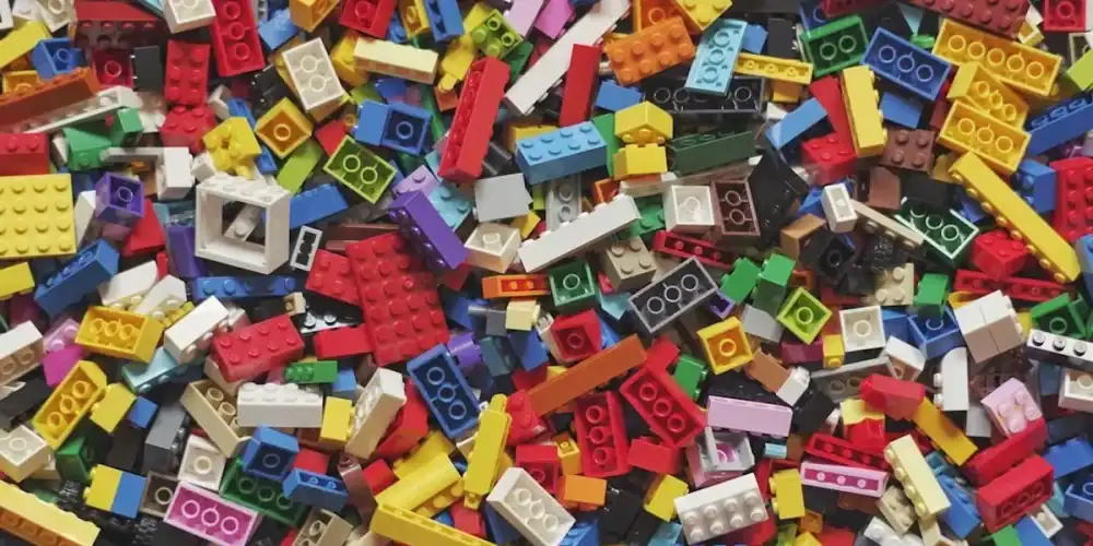Colorful LEGO bricks scattered in a random pile.