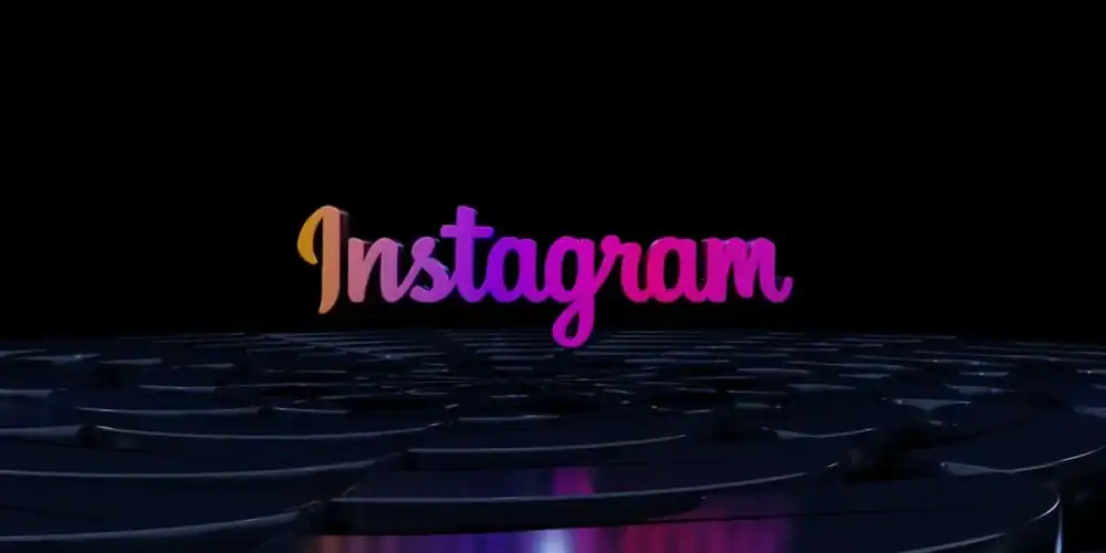 Instagram gradient logo above a reflective dark surface