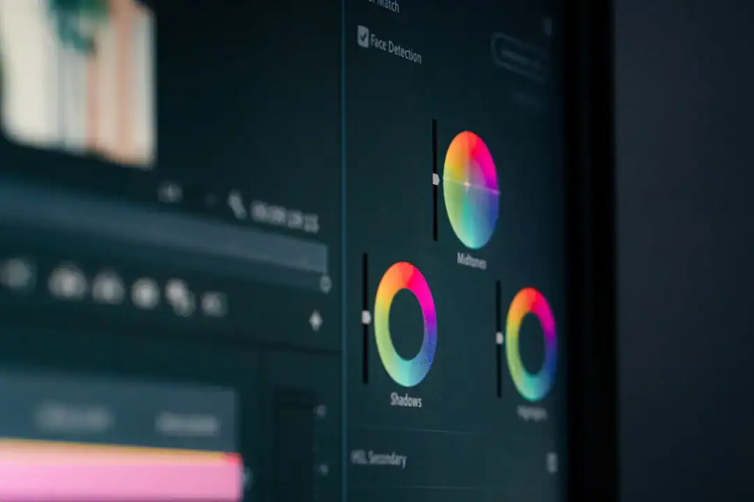 Close-up of color wheels and editing controls in a design app