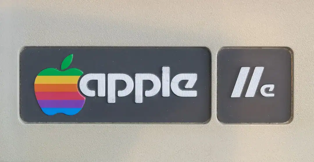 Vintage Apple IIe sign with rainbow Apple logo