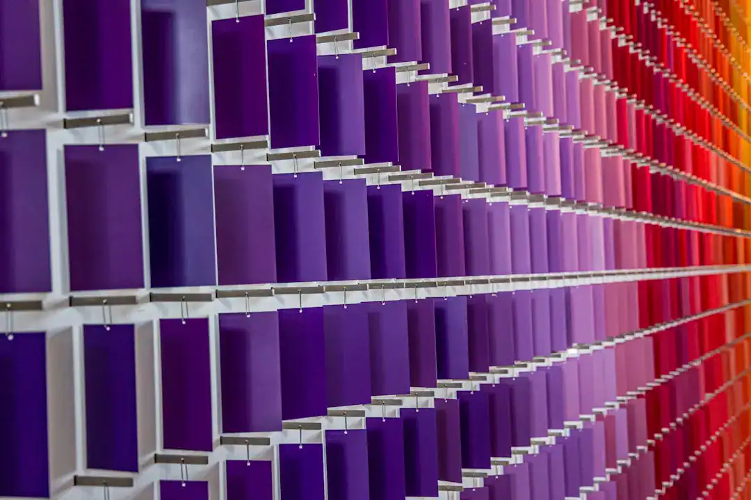 Purple vertical panels arranged in a grid fading to red on the right