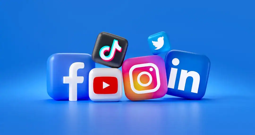 3D blocks with Facebook, YouTube, Instagram, LinkedIn logos and a TikTok icon on blue background