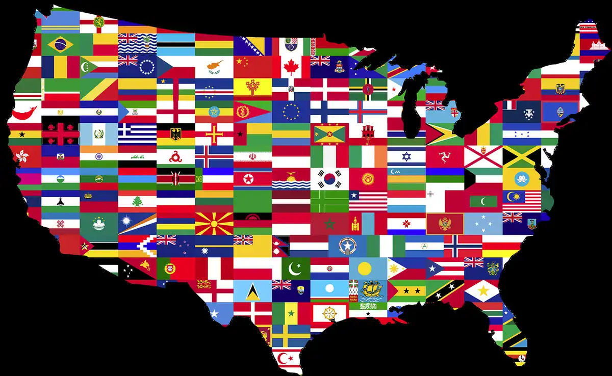 US map covered with many colorful international flags on a black background