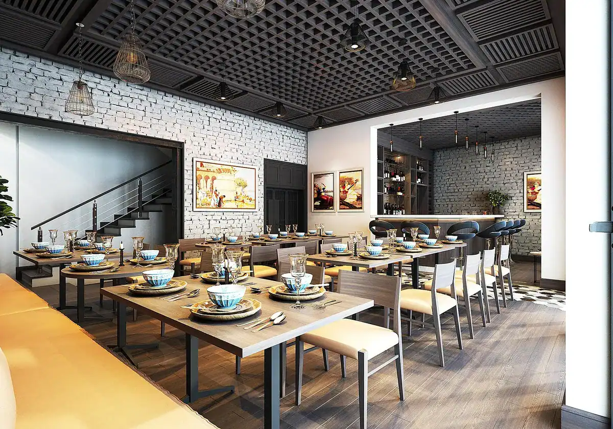 Contemporary restaurant interior with communal tables and stylish lighting.